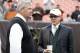 CLEVELAND - NOVEMBER 14: Head coach Rex Ryan (L) of the New York Jets talks with owner Woody Johnson prior to the start of their game against the Cleveland Browns at Cleveland Browns Stadium on November 14, 2010 in Cleveland, Ohio. (Photo by Matt Sullivan/Getty Images)