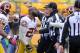 PITTSBURGH, PA - OCTOBER 28: DeAngelo Hall #23 of the Washington Redskins is held back by Lorenzo Alexander #97 of the Washington Redskins after being ejected from the game for arguing with Line Judge John Hussey #35 during the fourth quarter against the Pittsburgh Steelers on October 28, 2012 at Heinz Field in Pittsburgh, Pennsylvania. (Photo by Joe Sargent/Getty Images)