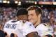 SAN DIEGO, CA - NOVEMBER 27: Tim Tebow #15 and Brian Dawkins #20 of the Denver Broncos celebrate a 16-13 overtime win over the San Diego Chargers at Qualcomm Stadium on November 27, 2011 in San Diego, California. (Photo by Harry How/Getty Images)