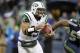 Nov 11, 2012; Seattle, WA, USA; New York Jets quarterback Tim Tebow (15) rushes against the Seattle Seahawks during the third quarter at CenturyLink Field. Mandatory Credit: Joe Nicholson-US PRESSWIRE