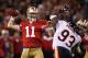 SAN FRANCISCO - NOVEMBER 12: Alex Smith #11 of the San Francisco 49ers throws a pass against the Chicago Bears at Candlestick Park on November 12, 2009 in San Francisco, California. (Photo by Jed Jacobsohn/Getty Images)