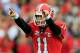 JACKSONVILLE, FL - OCTOBER 27: Aaron Murray #11 of the Georgia Bulldogs points during the game against the Florida Gators at EverBank Field on October 27, 2012 in Jacksonville, Florida. (Photo by Sam Greenwood/Getty Images)