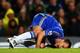 LONDON, ENGLAND - NOVEMBER 11: John Terry of Chelsea is injured in a collision with Luis Suarez of Liverpool during the Barclays Premier League match between Chelsea and Liverpool at Stamford Bridge on November 11, 2012 in London, England. (Photo by Clive Rose/Getty Images)