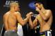 Nov 16, 2012; Montreal, QC, Canada; Georges St-Pierre (left) and Carlos Condit (right) face off during the weigh-in for UFC 154 at New City Gas. Mandatory Credit: Eric Bolte-US PRESSWIRE