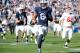 Nov 17, 2012; University Park, PA, USA; Penn State Nittany Lions wide receiver Allen Robinson (8) runs with the ball on his way to the end zone for a touchdown during the second quarter against the Indiana Hoosiers at Beaver Stadium. Mandatory Credit: Rich Barnes-US PRESSWIRE