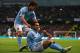 Tevez' big day has City temporarily in the, er, driver's seat.