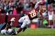 LANDOVER, MD - NOVEMBER 18: Wide receiver Santana Moss #89 of the Washington Redskins dives into the end zone past cornerback Brandon Boykin #22 of the Philadelphia Eagles to score a touchdown in the third quarter at FedEx Field on November 18, 2012 in Landover, Maryland. (Photo by Patrick Smith/Getty Images)