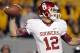 MORGANTOWN, WV - NOVEMBER 17: Landry Jones #12 of the Oklahoma Sooners drops back to pass against the West Virginia Mountaineers during the game on November 17, 2012 at Mountaineer Field in Morgantown, West Virginia. (Photo by Justin K. Aller/Getty Images)