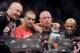 Nov 17, 2012; Montreal, QC, Canada; Georges St-Pierre poses for a photo with his team after winning the Welterweight Championship bout against Carlos Condit at UFC 154 at the Bell Centre. St-Pierre defeated Condit by unanimous decision. Mandatory Credit: Eric Bolte-US PRESSWIRE