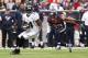 November 18, 2012; Houston, TX, USA; Jacksonville Jaguars wide receiver Justin Blackmon (14) makes a reception during the first quarter as Houston Texans strong safety Glover Quin (29) defends at Reliant Stadium. Mandatory Credit: Troy Taormina-US PRESSWIRE
