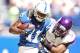 INDIANAPOLIS, IN - SEPTEMBER 16: Donnie Avery #11 of the Indianapolis Colts runs with the ball while defended by Erin Henderson #50 of the Minnesota Vikings during the NFL game at Lucas Oil Stadium on September 16, 2012 in Indianapolis, Indiana. (Photo by Andy Lyons/Getty Images)