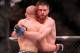 Nov 17, 2012; Montreal, QC, Canada; Carlos Condit (right) embraces Georges St-Pierre after their Welterweight Championship bout at UFC 154 at the Bell Centre. St-Pierre defeated Condit by unanimous decision. Mandatory Credit: Eric Bolte-US PRESSWIRE