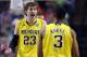 NASHVILLE, TN - MARCH 16: Evan Smotrycz #23 of the Michigan Wolverines talks with Trey Burke #3 of the Michigan Wolverines against the Ohio Bobcats during the second round of the 2012 NCAA Men's Basketball Tournament at Bridgestone Arena on March 16, 2012 in Nashville, Tennessee. (Photo by Jamie Squire/Getty Images)
