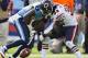 NASHVILLE, TN - NOVEMBER 4: Chris Johnson #28 of the Tennessee Titans fumbles the ball after being hit by Charles Tillman #33 of the Chicago Bears at LP Field on November 4, 2012 in Nashville, Tennessee. (Photo by Wesley Hitt/Getty Images)
