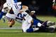 FOXBORO, MA - NOVEMBER 18: Andrew Luck #12 of the Indianapolis Colts is tackled by the New England Patriots after running with the ball during the game on November 18, 2012 at Gillette Stadium in Foxboro, Massachusetts. (Photo by Jared Wickerham/Getty Images)