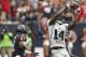 HOUSTON, TX - NOVEMBER 18: Justin Blackmon #14 of the Jacksonville Jaguars makes a catch over Brice McCain #21 of the Houston Texans at Reliant Stadium on November 18, 2012 in Houston, Texas. Houston wins 43-37 in overtime. (Photo by Bob Levey/Getty Images)