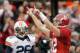 TUSCALOOSA, AL - NOVEMBER 26: Quarterback Greg McElroy #12 of the Alabama Crimson Tide reacts a throwing for a touchdown against the Auburn Tigers at Bryant-Denny Stadium on November 26, 2010 in Tuscaloosa, Alabama. (Photo by Kevin C. Cox/Getty Images)