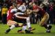 Aldon and Justin Smith sacked Chicago Bears QB Jason Campbell six times on Monday night.