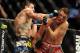 February 4, 2012; Las Vegas, NV, USA; UFC fighter Carlos Condit (left) fights against Nick Diaz (right) during UFC 143 at the Mandalay Bay Events Center. Carlos Codit defeated Nick Diaz. Mandatory Credit: Kelvin Kuo-US PRESSWIRE