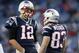 Nov 18, 2012; Foxborough, MA, USA; New England Patriots quarterback Tom Brady (12) talks with wide receiver Wes Welker (83) before the start of the game against the Indianapolis Colts at Gillette Stadium. Mandatory Credit: David Butler II-US PRESSWIRE