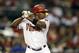 PHOENIX, AZ - OCTOBER 02: Justin Upton #10 of the Arizona Diamondbacks bats against the Colorado Rockies during the MLB game at Chase Field on October 2, 2012 in Phoenix, Arizona. The Diamondbacks defeated the Rockies 5-3. (Photo by Christian Petersen/Getty Images)