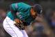 May 6, 2011; Seattle, WA, USA; Seattle Mariners third baseman Chone Figgins (9) fields a ground ball against the Chicago White Sox in the second inning at Safeco Field. Mandatory Credit: Steven Bisig-US PRESSWIRE