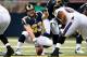 ST. LOUIS, MO - AUGUST 30: Center Scott Wells #63 of the St. Louis Rams calls out a read prior to the snap during the game against the Baltimore Ravens at the Edward Jones Dome on August 30, 2012 in St. Louis, Missouri. The St. Louis Rams defeated the Baltimore Ravens 31-17. (Photo by David Welker/Getty Images)