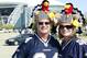 Nov 24, 2011; Arlington, TX, USA; Dallas Cowboys fans pose with turkey themed hats on their heads before the Thanksgiving day game against the Miami Dolphins at Cowboys Stadium. Mandatory Credit: Tim Heitman-US PRESSWIRE
