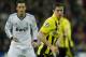 MADRID, SPAIN - NOVEMBER 06: Robert Lewandowski of Borussia Dortmund controls the ball backdropped by Mesut Ozil of Real Madrid during the UEFA Champions League group D match between Real Madrid and Borussia Dortmund at Estadio Santiago Bernabeu on November 6, 2012 in Madrid, Spain. (Photo by Jasper Juinen/Getty Images)