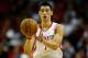 HOUSTON, TX - NOVEMBER 12: Jeremy Lin #7 of the Houston Rockets passes the ball against the Miami Heat at the Toyota Center on November 12, 2012 in Houston, Texas. NOTE TO USER: User expressly acknowledges and agrees that, by downloading and or using this photograph, User is consenting to the terms and conditions of the Getty Images License Agreement. (Photo by Scott Halleran/Getty Images)