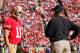 SAN FRANCISCO, CA - NOVEMBER 11: Quarterback Alex Smith #11 talks with head coach Jim Harbaugh of the San Francisco 49ers during a timeout against the St. Louis Rams on November 11, 2012 at Candlestick Park in San Francisco, California. The teams tied 24-24 in overtime. (Photo by Brian Bahr/Getty Images)