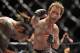 Jun 22, 2012; Atlantic City, NJ, USA; Clay Guida (left) fights Gray Maynard in a lightweight bout during UFC on FX at Revel Resort and Casino. Gray Maynard won the fight by split decision in the fifth round. Mandatory Credit: Joe Camporeale-US PRESSWIRE