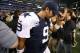 Nov 22, 2012; Arlington, TX, USA; Dallas Cowboys quarterback Tony Romo (9) lowers his head as he leaves the field after a loss against the Washington Redskins during a game on Thanksgiving at Cowboys Stadium. The Redskins beat the Cowboys 38-31. Mandatory Credit: Matthew Emmons-US PRESSWIRE