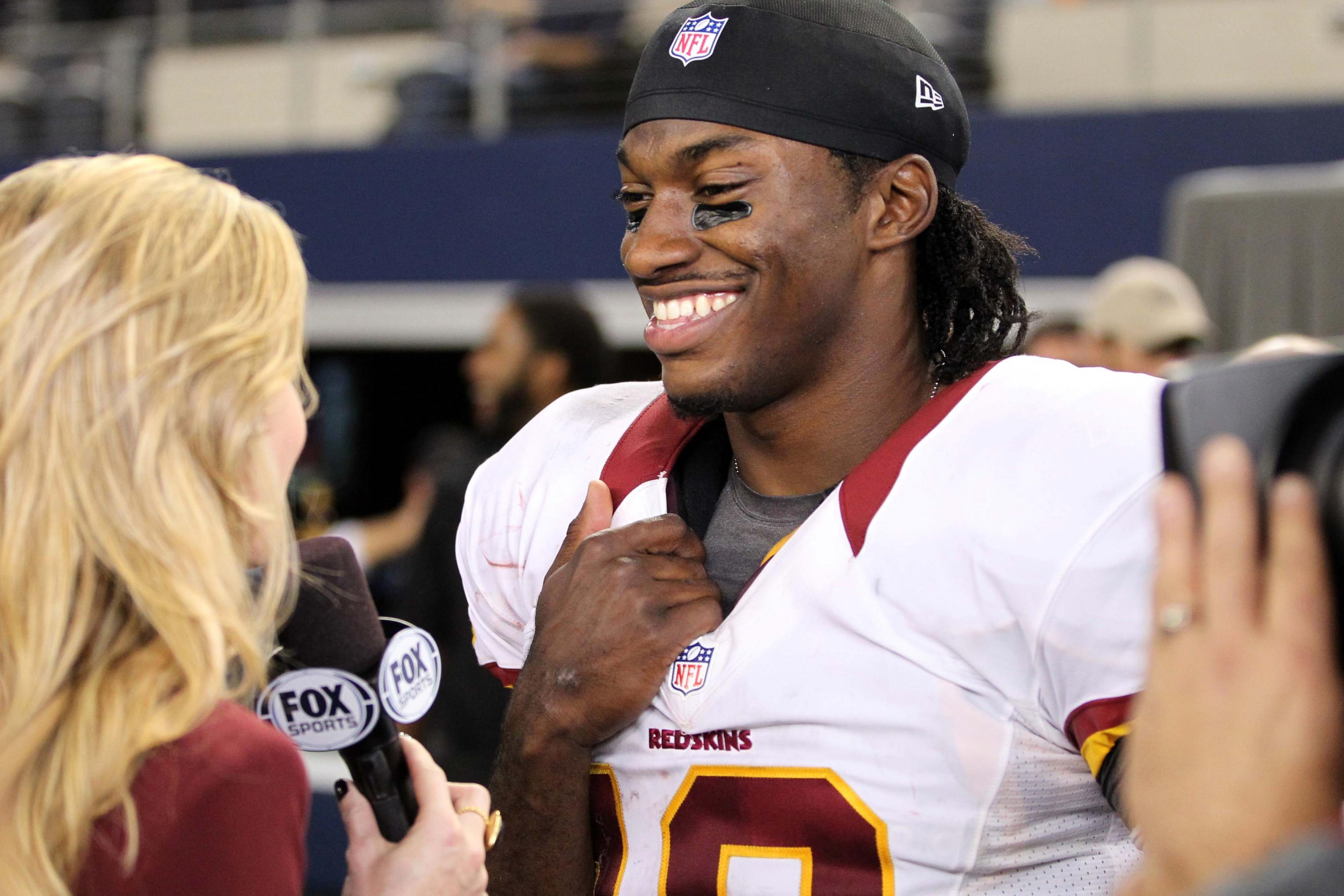 Griffin shines; Redskins hold off Cowboys 38-31