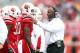 LOUISVILLE, KY - NOVEMBER 03: Charlie Strong the head coach of the Louisville Cardinals talks with Jermaine Reve #27 during the game against the Temple Owls at Papa John's Cardinal Stadium on November 3, 2012 in Louisville, Kentucky. (Photo by Andy Lyons/Getty Images)