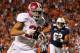 AUBURN, AL - NOVEMBER 26: Dee Milliner #28 of the Alabama Crimson Tide returns an interception for a touchdown against the Auburn Tigers at Jordan-Hare Stadium on November 26, 2011 in Auburn, Alabama. (Photo by Kevin C. Cox/Getty Images)