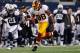 ARLINGTON, TX - NOVEMBER 22: Pierre Garcon #88 of the Washington Redskins carries the ball to score a touchdown against Mike Jenkins #21 of the Dallas Cowboys on Thanksgiving Day at Cowboys Stadium on November 22, 2012 in Arlington, Texas. (Photo by Tom Pennington/Getty Images)
