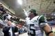 ST. LOUIS, MO - NOVEMBER 18: quarterback Tim Tebow #15 of the New York Jets tosses a towel to a fan after the game against the St. Louis Rams at the Edward Jones Dome on November 18, 2012 in St. Louis, Missouri. (Photo by David Welker/Getty Images)