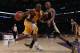 LOS ANGELES, CA - JANUARY 25: Kobe Bryant #24 of the Los Angeles Lakers drives to the basket while being defended by Raja Bell #19 of the Utah Jazz in the second half at Staples Center on January 25, 2011 in Los Angeles, California. The Lakers defeated the Jazz 120-91. NOTE TO USER: User expressly acknowledges and agrees that, by downloading and or using this photograph, User is consenting to the terms and conditions of the Getty Images License Agreement. (Photo by Jeff Gross/Getty Images)