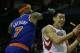 HOUSTON, TX - NOVEMBER 23: Jeremy Lin #7 of the Houston Rockets drives past Carmelo Anthony #7 of the New York Knicks at the Toyota Center on November 23, 2012 in Houston, Texas. NOTE TO USER: User expressly acknowledges and agrees that, bagainst the Newy downloading and or using this photograph, User is consenting to the terms and conditions of the Getty Images License Agreement. (Photo by Scott Halleran/Getty Images)