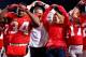 COLUMBUS, OH - NOVEMBER 03: Head Coach Urban Meyer of the Ohio State Buckeyes and his wife, Shelly Meyer sing 'Carmen Ohio' after Ohio State defeated the Illinois Illini 52-22 on November 3, 2012 at Ohio Stadium in Columbus, Ohio. (Photo by Kirk Irwin/Getty Images)