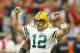 Oct 14, 2012; Houston, TX, USA; Green Bay Packers quarterback Aaron Rodgers (12) celebrates a touchdown pass against the Houston Texans in the second quarter at Reliant Stadium. Mandatory Credit: Brett Davis-US PRESSWIRE