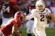 November 10, 2012; Tuscaloosa, AL, USA; Texas A&M Aggies quarterback Johnny Manziel (2) stiff arms Alabama Crimson Tide defensive back Deion Belue (13) during the first quarter at Bryant Denny Stadium. Mandatory Credit: John David Mercer-US PRESSWIRE