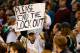 BOSTON, MA - NOVEMBER 14: A fan holds up a 'Please end the lockout' sign while wearing a Boston Bruins jersey during the game between the Boston Celtics and the Utah Jazz on November 14, 2012 at TD Garden in Boston, Massachusetts. NOTE TO USER: User expressly acknowledges and agrees that, by downloading and or using this photograph, User is consenting to the terms and conditions of the Getty Images License Agreement. (Photo by Jared Wickerham/Getty Images)