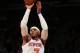 NEW YORK, NY - NOVEMBER 09: Carmelo Anthony #7 of the New York Knicks takes a shot in the second half against the Dallas Mavericks on November 9, 2012 at Madison Square Garden in New York City.The New York Knicks defeated the Dallas Mavericks 104-94. NOTE TO USER: User expressly acknowledges and agrees that, by downloading and/or using this photograph, user is consenting to the terms and conditions of the Getty Images License Agreement. (Photo by Elsa/Getty Images)