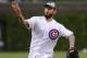 CHICAGO, IL - MAY 08: WWE Champion CM Punk throws out the first pitch before the Chicago Cubs versus the Atlanta Braves game on May 8, 2012 at Wrigley Field in Chicago, Illinois. (Photo by David Banks/Getty Images)
