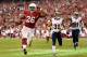 GLENDALE, AZ - NOVEMBER 25: Running back Beanie Wells #26 of the Arizona Cardinals carries the football into the endzone to score a 12 yard rushing touchdown past cornerback Cortland Finnegan #31 of the St. Louis Rams during the second quarter of the NFL game at the University of Phoenix Stadium on November 25, 2012 in Glendale, Arizona. (Photo by Christian Petersen/Getty Images)