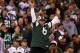 EAST RUTHERFORD, NJ - OCTOBER 08: New York Jets fan Fireman Ed Anzalone leads the fans in cheers against the Houston Texans at MetLife Stadium on October 8, 2012 in East Rutherford, New Jersey. (Photo by Elsa/Getty Images)