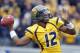 MORGANTOWN, WV - NOVEMBER 03: Geno Smith #12 of the West Virginia Mountaineers drops back to pass against the TCU Horned Frogs during the game on November 3, 2012 at Mountaineer Field in Morgantown, West Virginia. (Photo by Justin K. Aller/Getty Images)