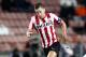 EINDHOVEN, NETHERLANDS - OCTOBER 25: Kevin Strootman of PSV Eindhoven takes the ball past Viktor Lundberg of AIK during the UEFA Europa League group stage match between PSV Eindhoven and AIK held on October 25, 2012 at the PSV Stadion, in Eindhoven, Netherlands. (Photo by Vincent Jannink/EuroFootball/Getty Images)